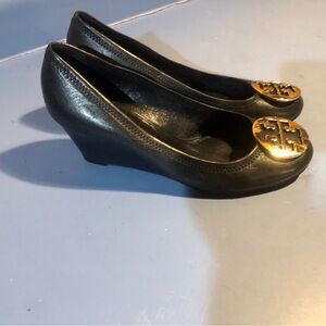 Tory Burch Black Leather Wedge Pumps with Gold Logo Disc